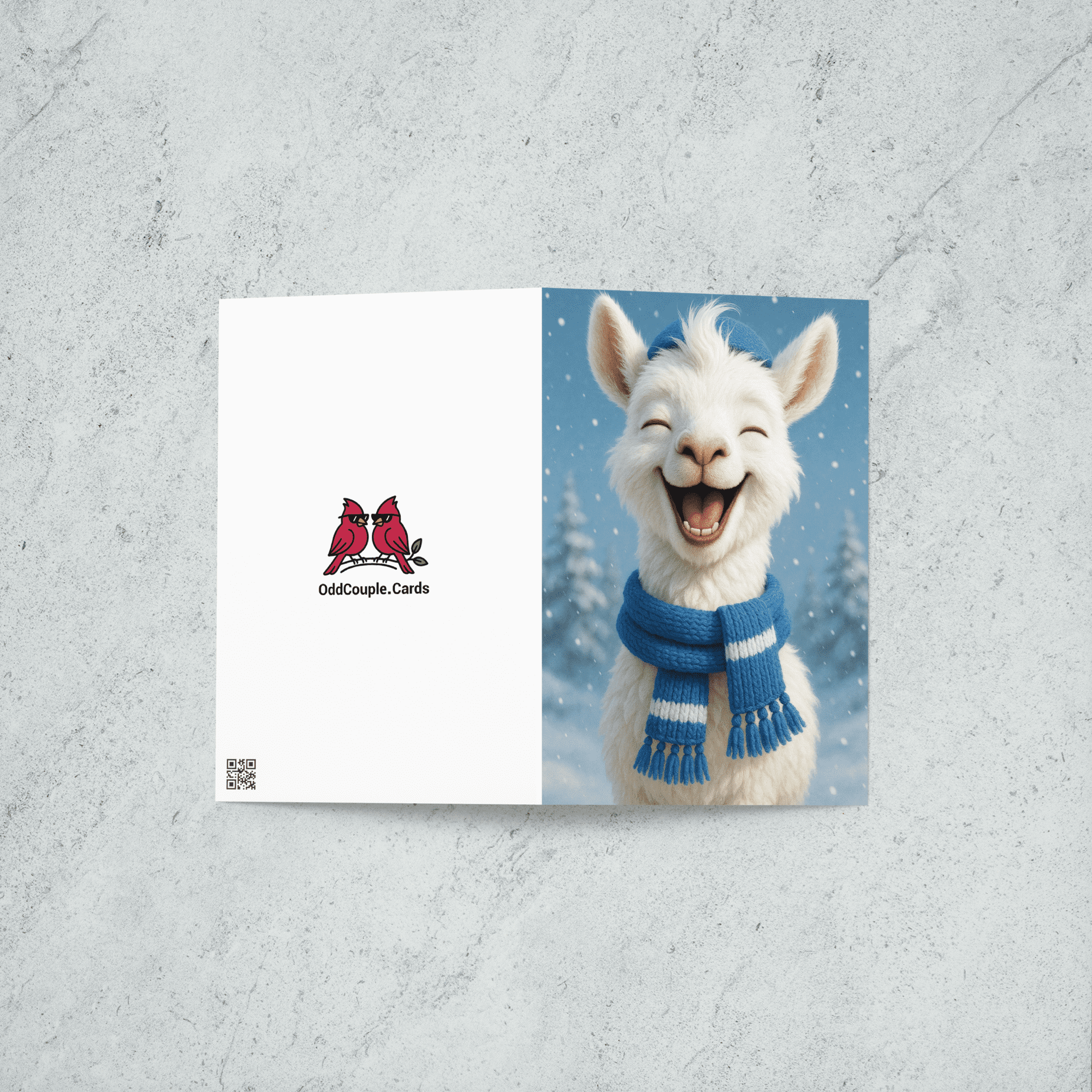 a young llama wearing a hat and scarf outside in the snow